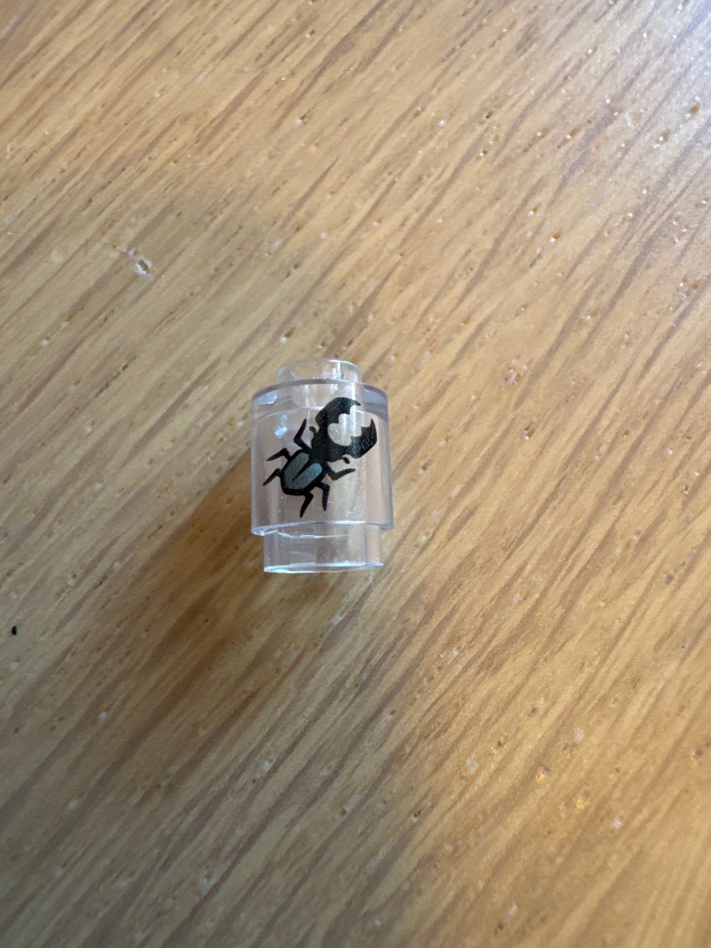 Brick, Round 1 x 1 with Black and Metallic Light Blue Stag Beetle Pattern