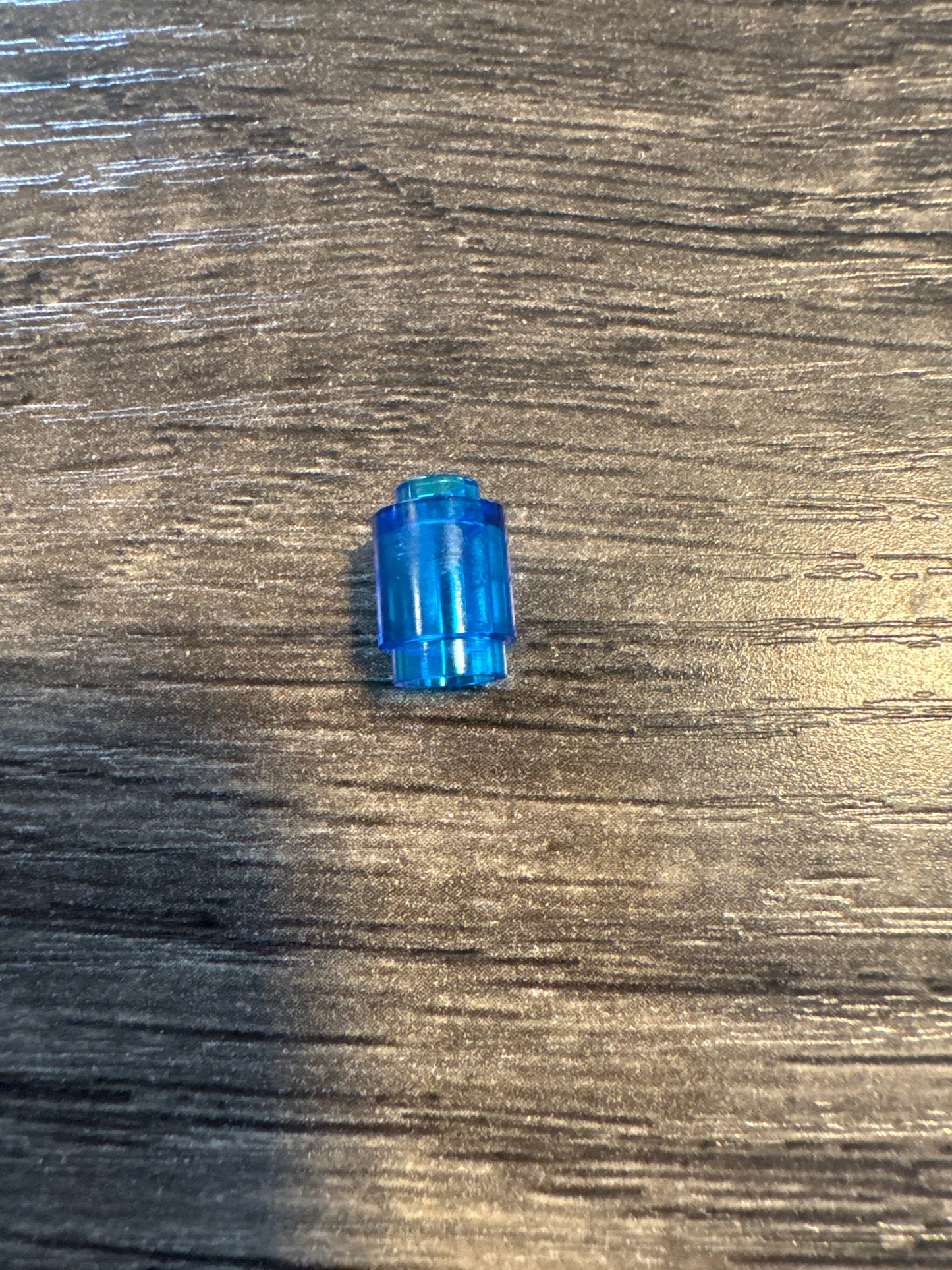 Brick, Round 1 x 1 trans-dark blue