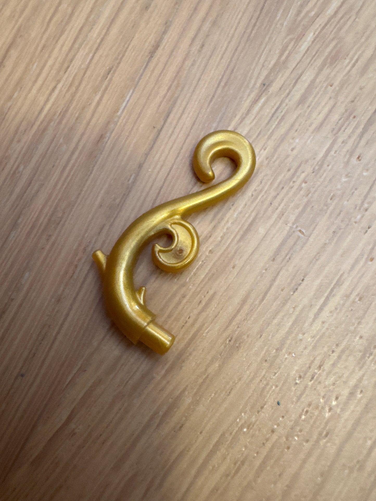 Plant Stem, Curved with Bar, Thorns, and Swirls pearl gold