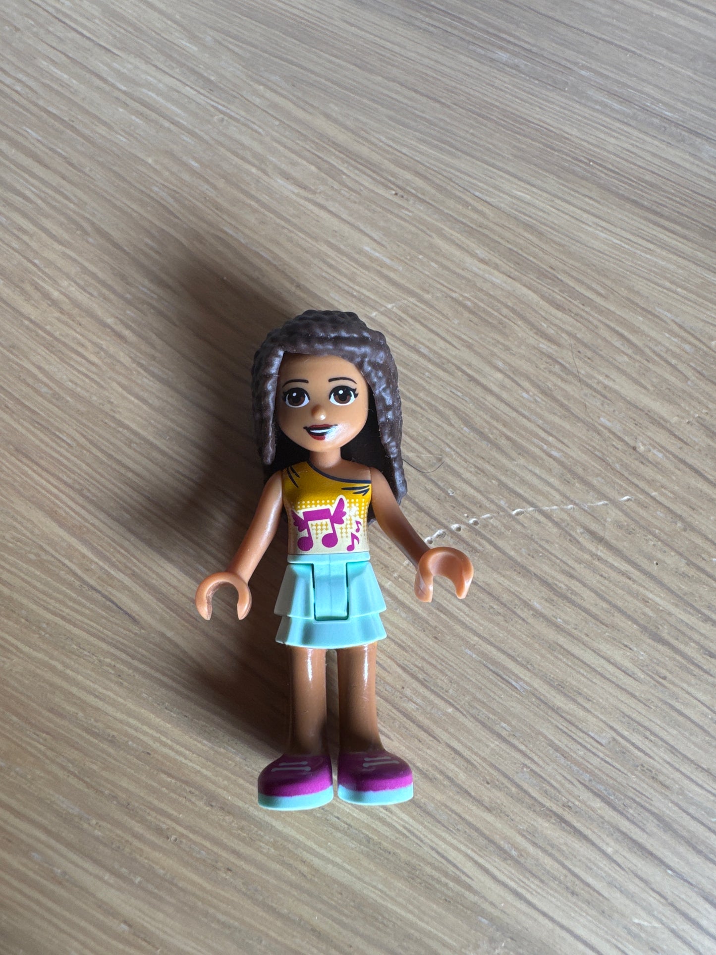 Friends Andrea - Light Aqua Layered Skirt, Bright Light Orange Top with Winged Music Notes