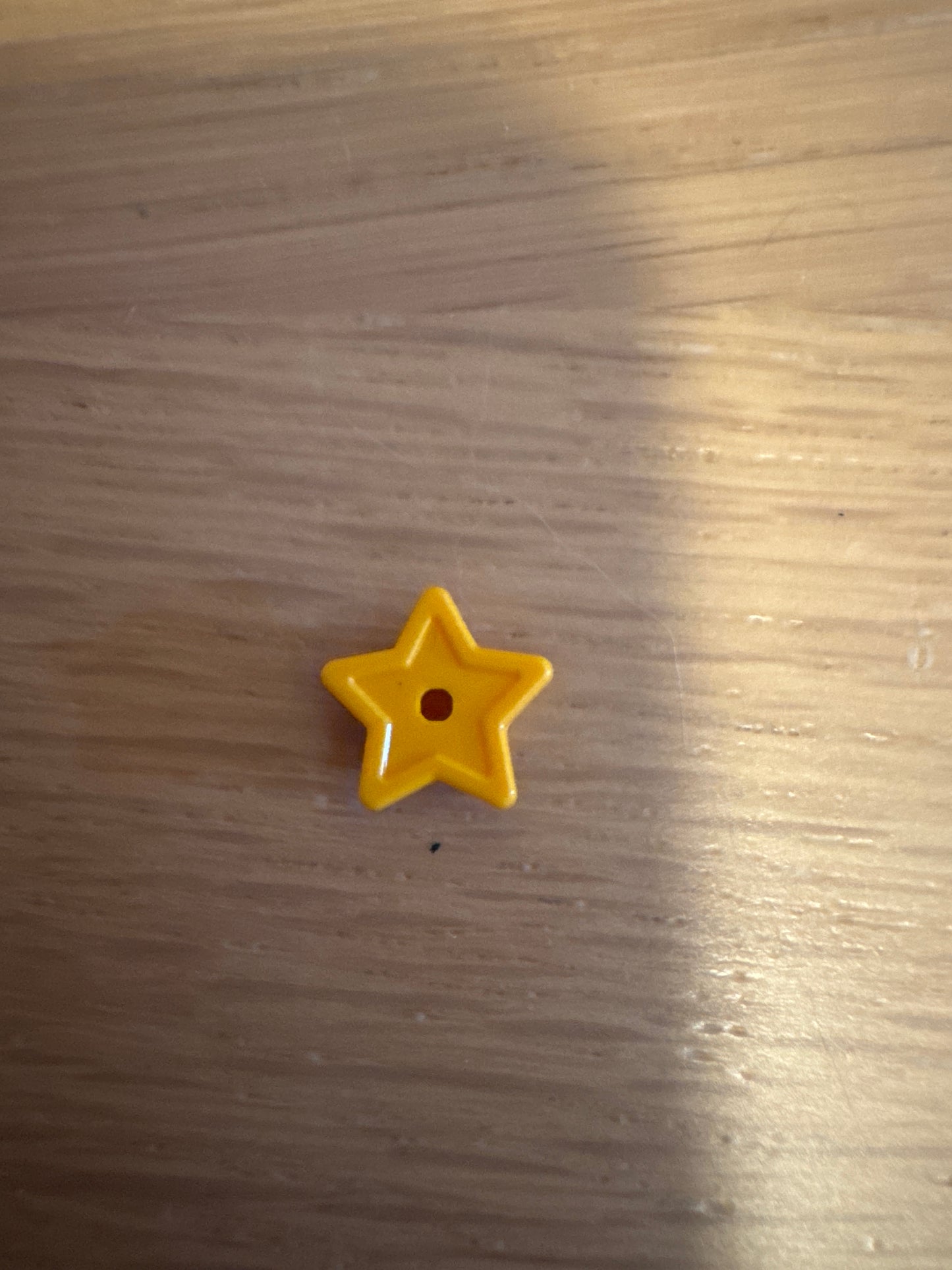 Plate, Round 1 x 1 with Star and Small Pin Hole bright light orange