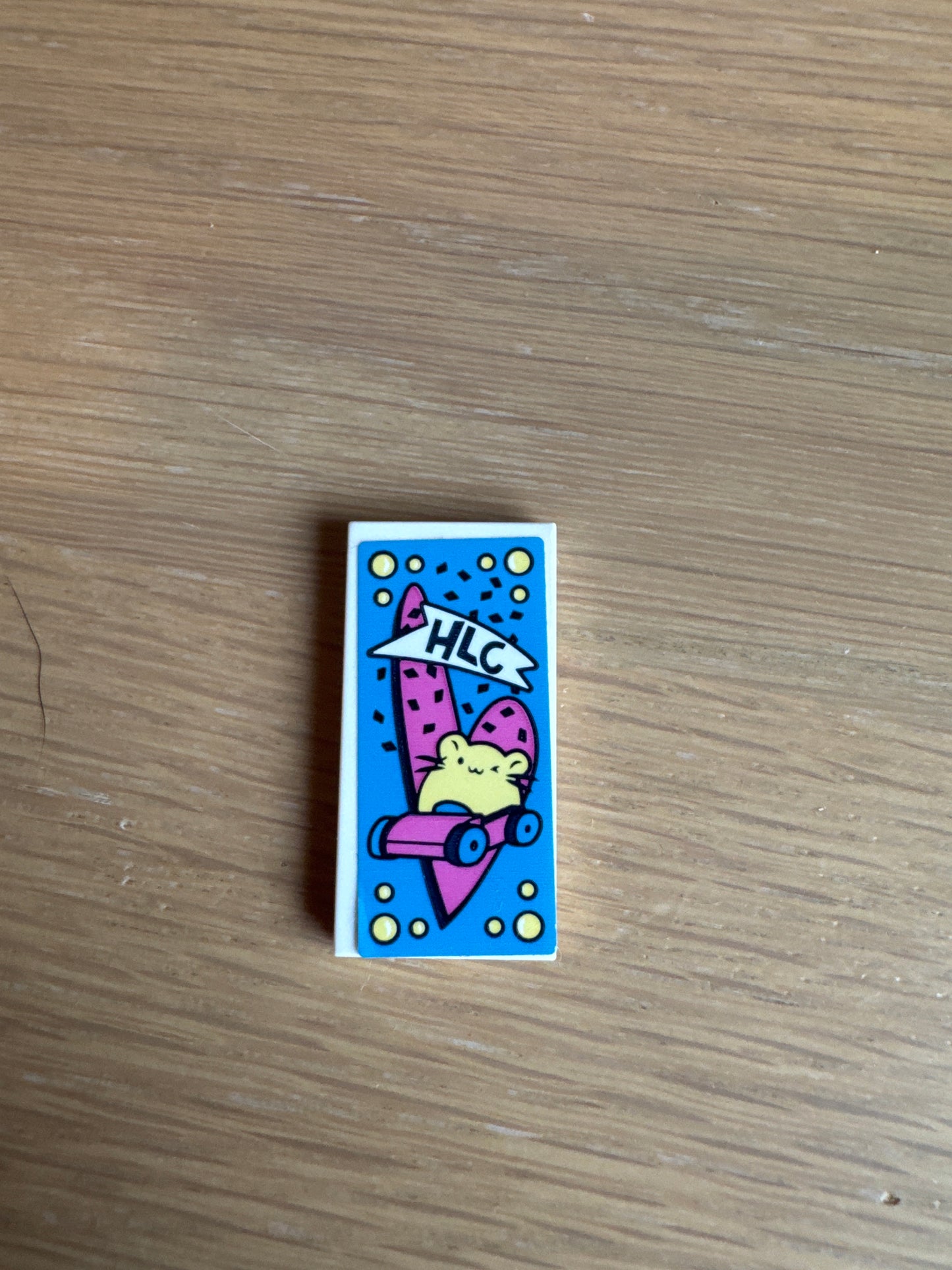 Tile 2 x 4 with 'HLC', Bright Light Yellow Hamster Driving Car and Dark Pink Heart on Dark Azure Background Pattern (Sticker) - Set 41383