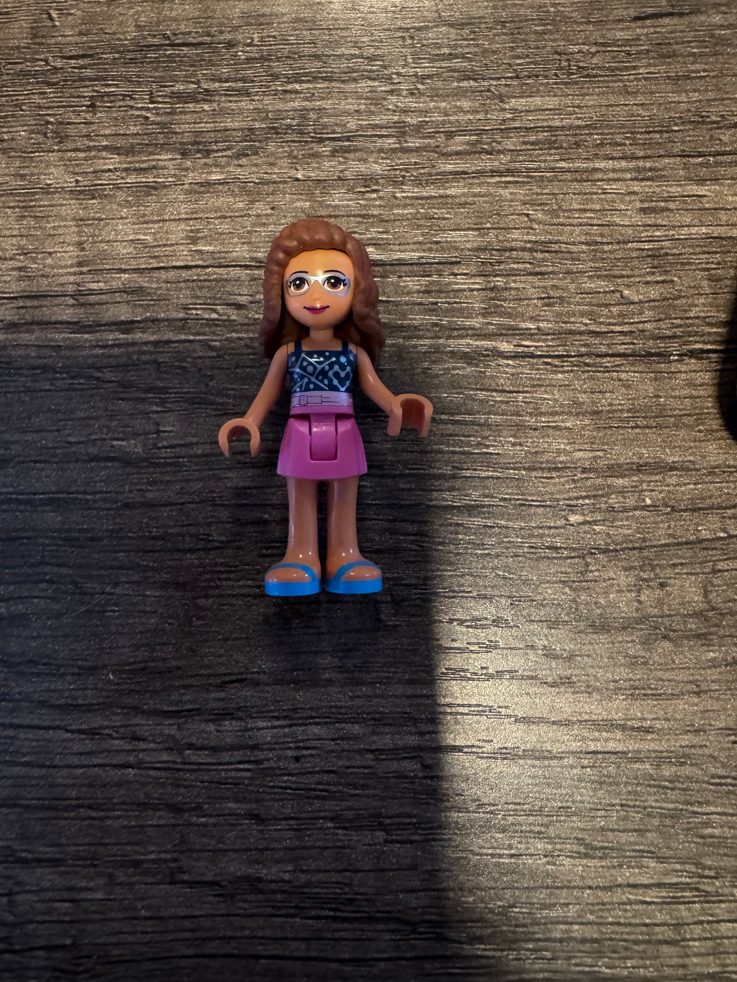 Friends Olivia with dark pink skirt