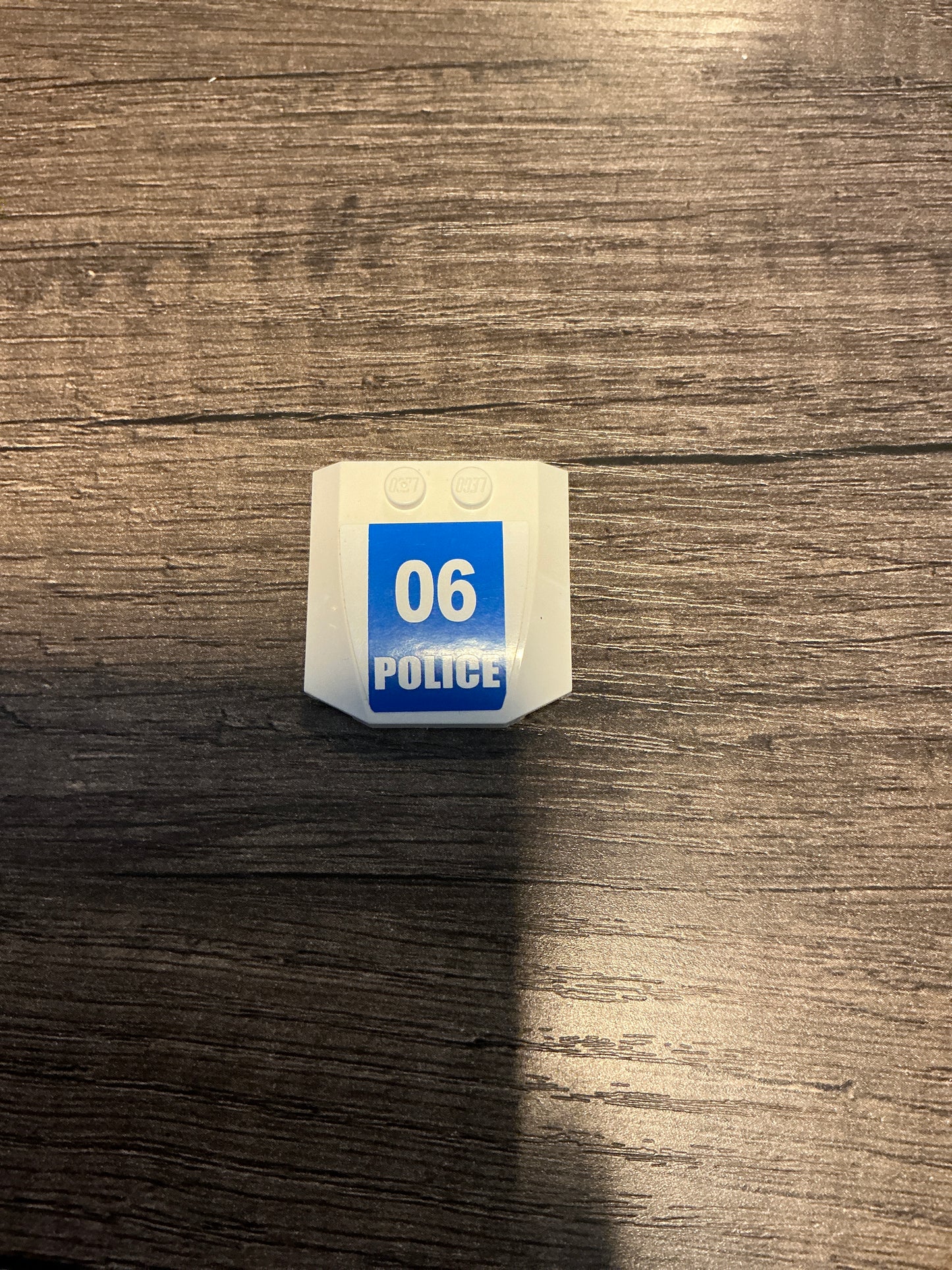 Wedge 4 x 4 x 2/3 Triple Curved with White '06 POLICE' on Blue Background Pattern (Sticker) - Set 3661