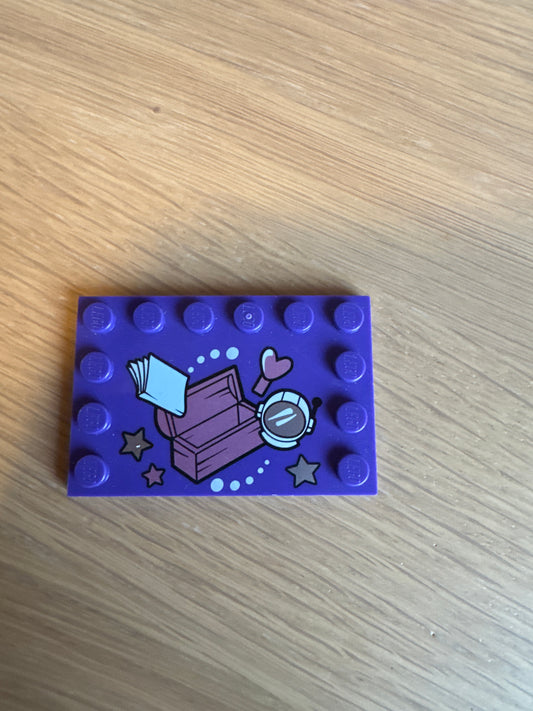 Tile, Modified 4 x 6 with Studs on Edges with Treasure Chest, Space Helmet, and Book Pattern