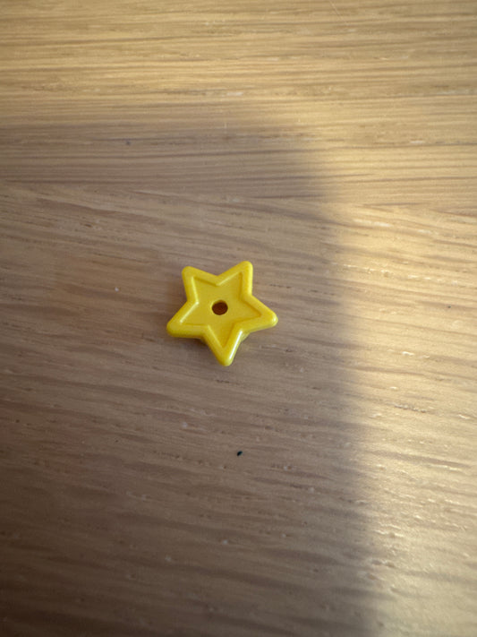 Plate, Round 1 x 1 with Star and Small Pin Hole yellow