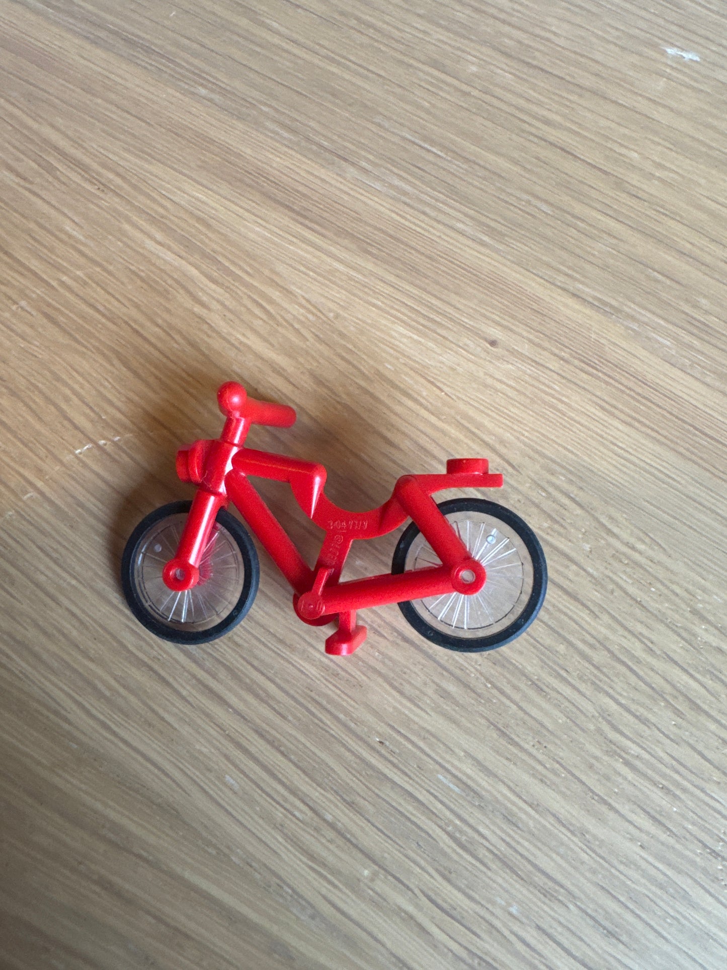 Bicycle with Handlebars with Trans-Clear Wheels with Molded Black Hard Rubber Tires (4719 / 92851pb01) red